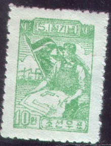 A1955朝鲜55年-国际劳动节.拿施工图的工人.国旗.jpg